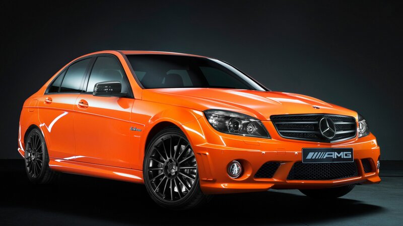 orange mercedes-amg sedan