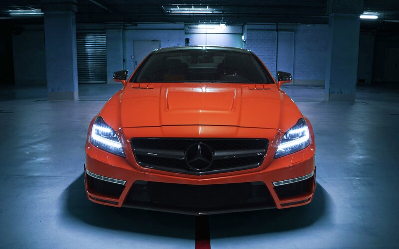 orange mercedes-benz in garage