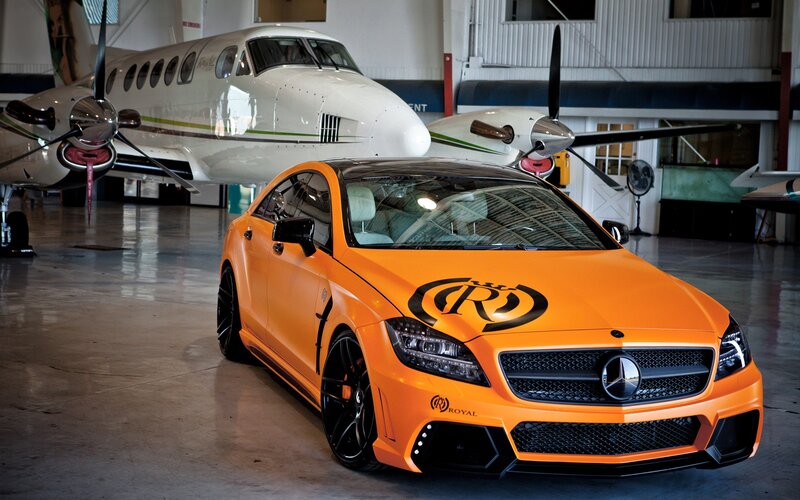 Orange Mercedes-Benz in hangar