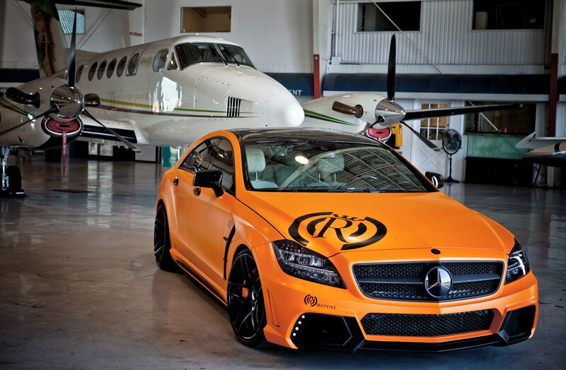 Orange Mercedes-Benz in hangar