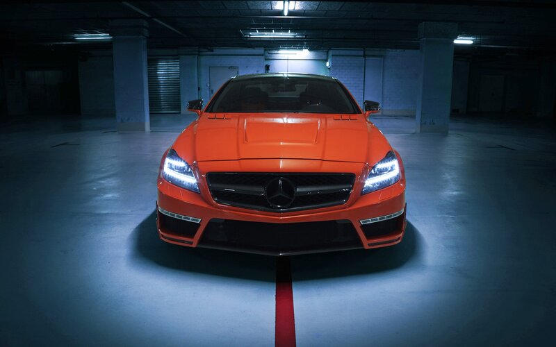 Orange Mercedes-Benz in parking garage