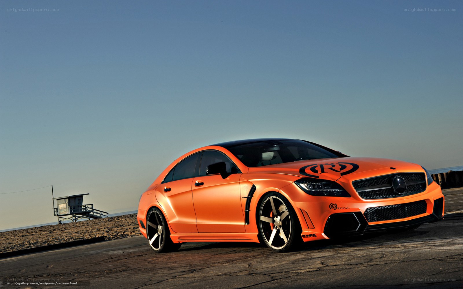 Orange Mercedes-Benz on beach