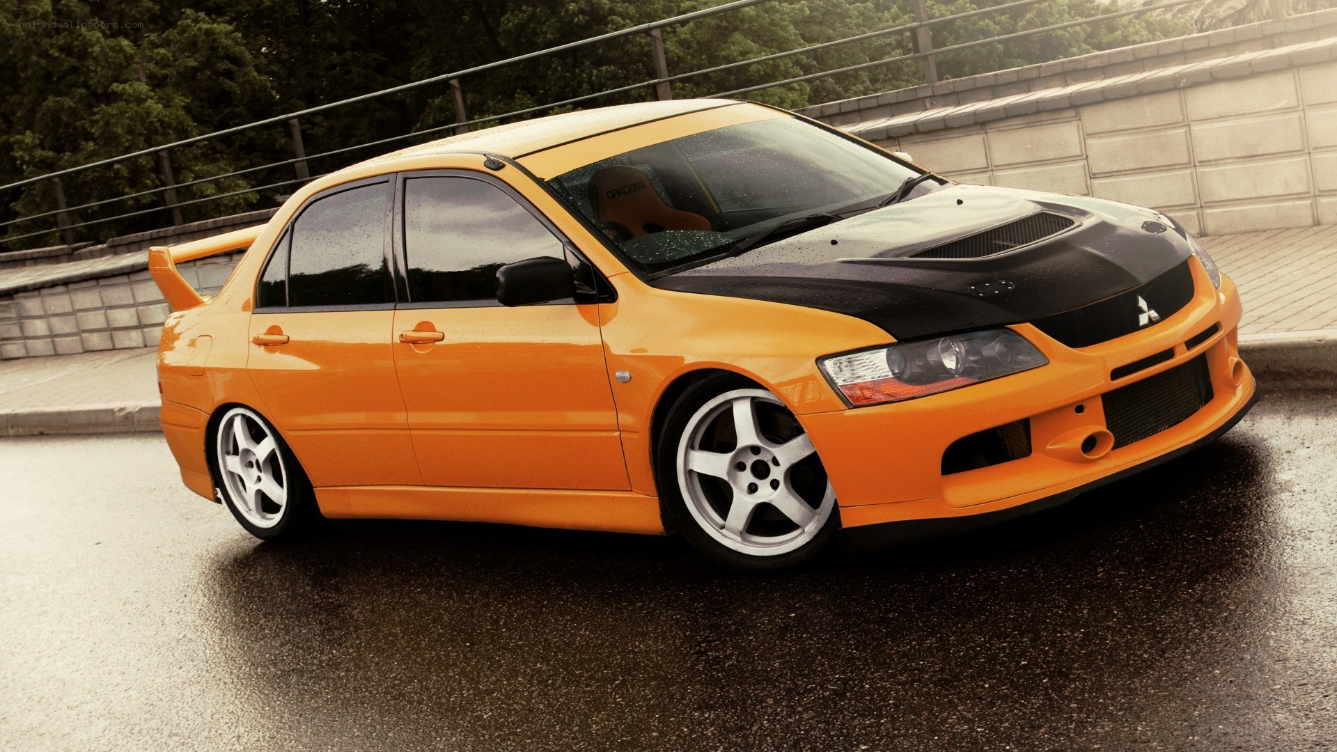 orange mitsubishi lancer evolution