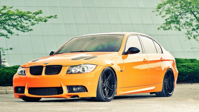 orange modified BMW sedan