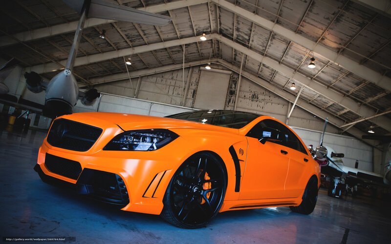 Orange Modified Car — Dramatic, Photograph, Airplane, Hangar, Black Wheels