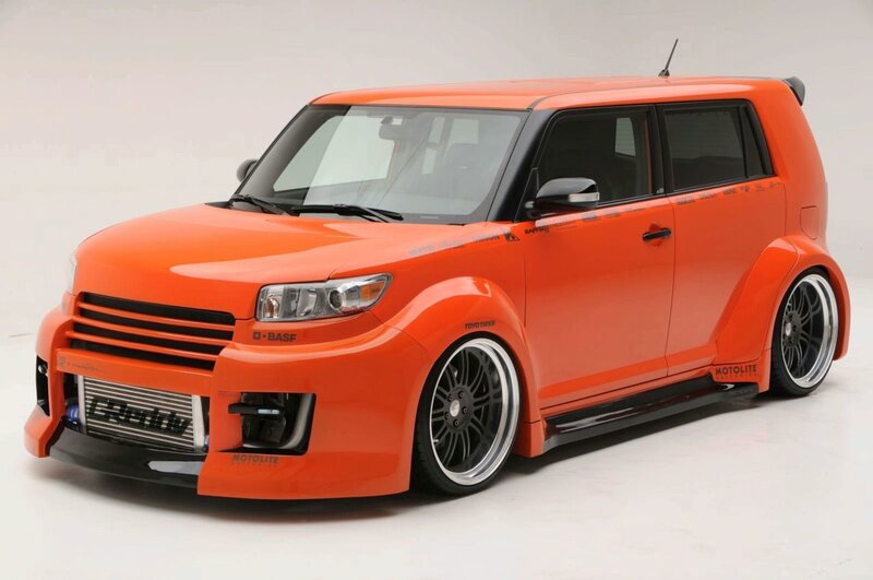Orange Modified Car — Neutral, Photograph, Wheels, Grille
