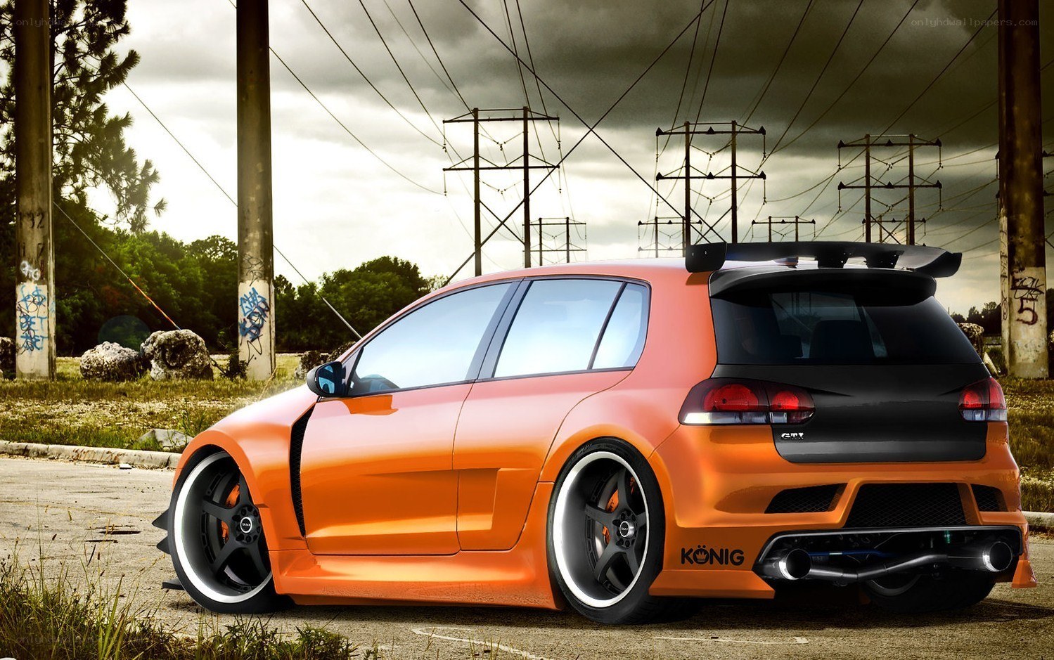 Orange modified hatchback car