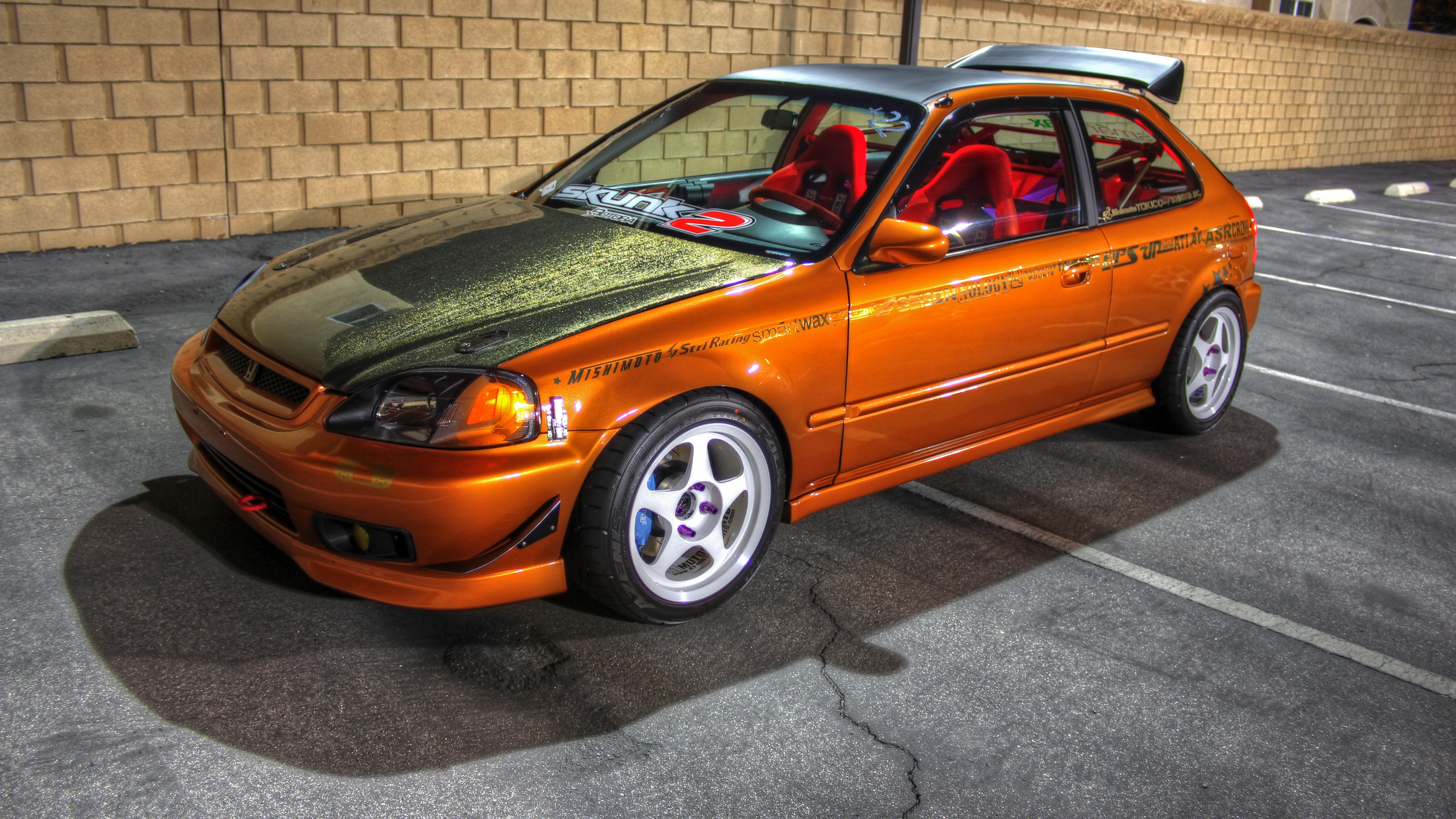 orange modified hatchback car