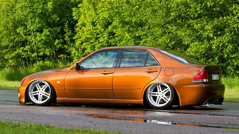 Orange Modified Sedan — Calm, Afternoon