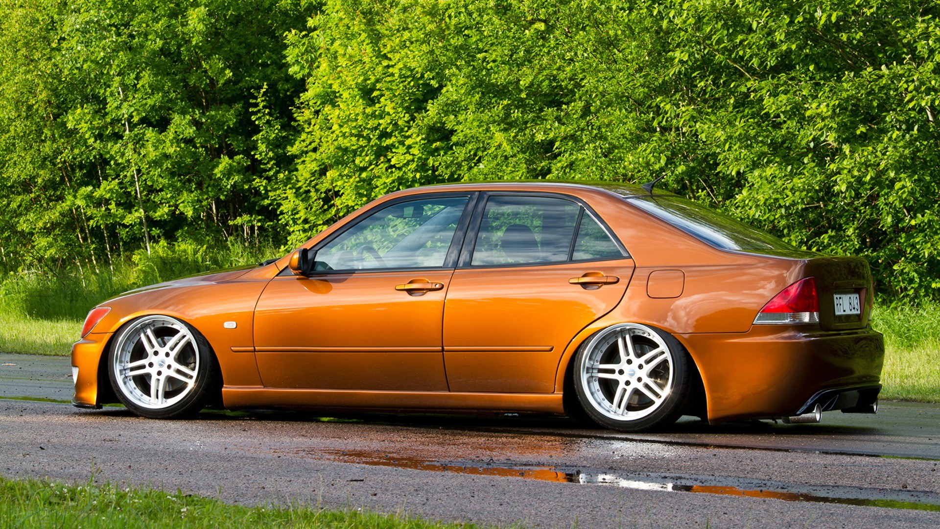 orange modified sedan car