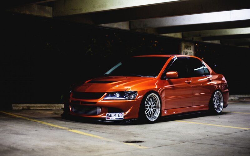 Orange Modified Sedan — Dramatic, Night