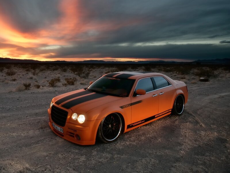 Orange Modified Sedan — Dramatic, Sunset