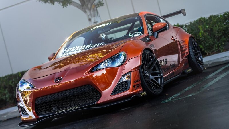 Orange Modified Sports Car — Dramatic, Afternoon