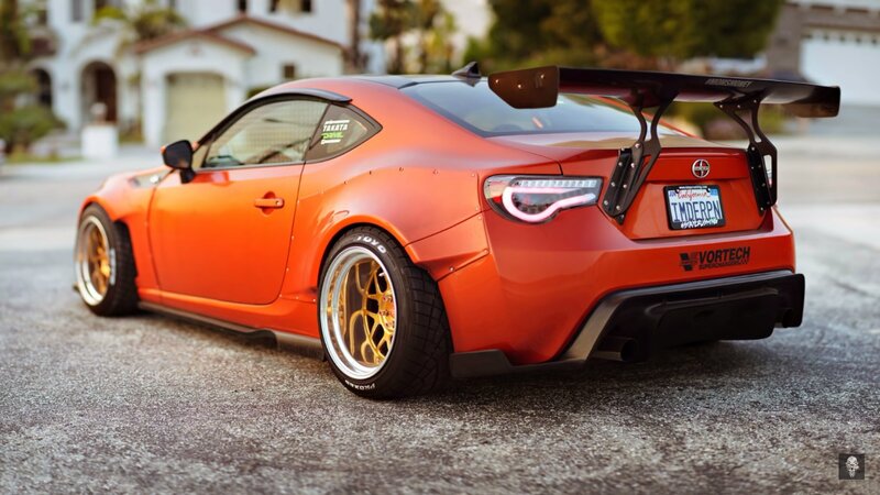 Orange Modified Sports Car — Dramatic, Sunset