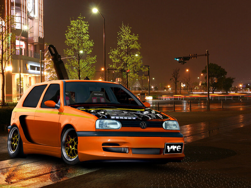 Orange modified Volkswagen at night