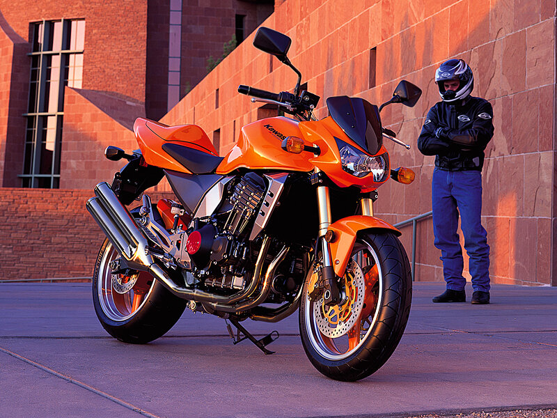 Orange Motorcycle and Rider