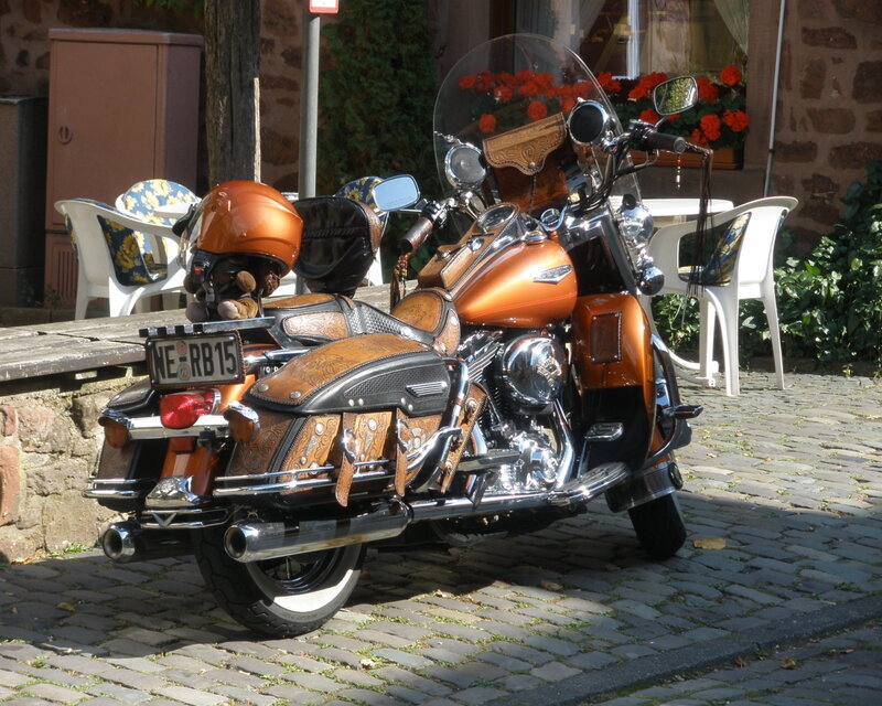 Orange Motorcycle on Cobblestones