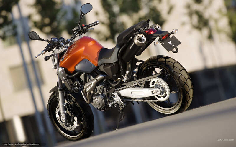 orange motorcycle on display