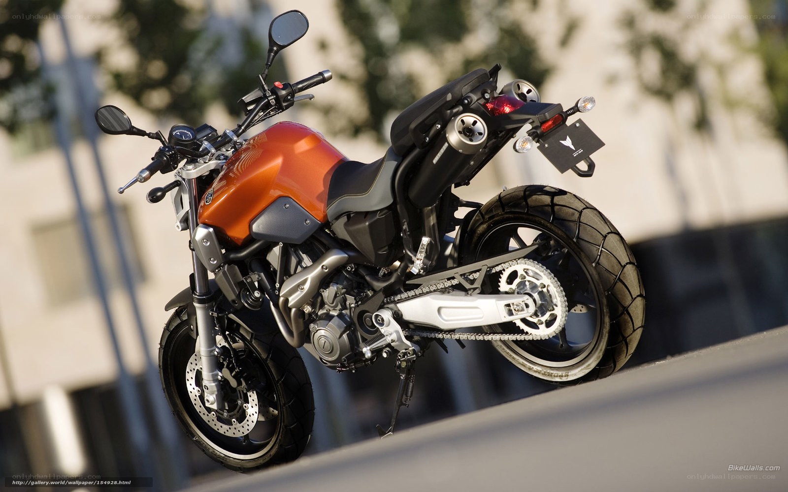 orange motorcycle on display
