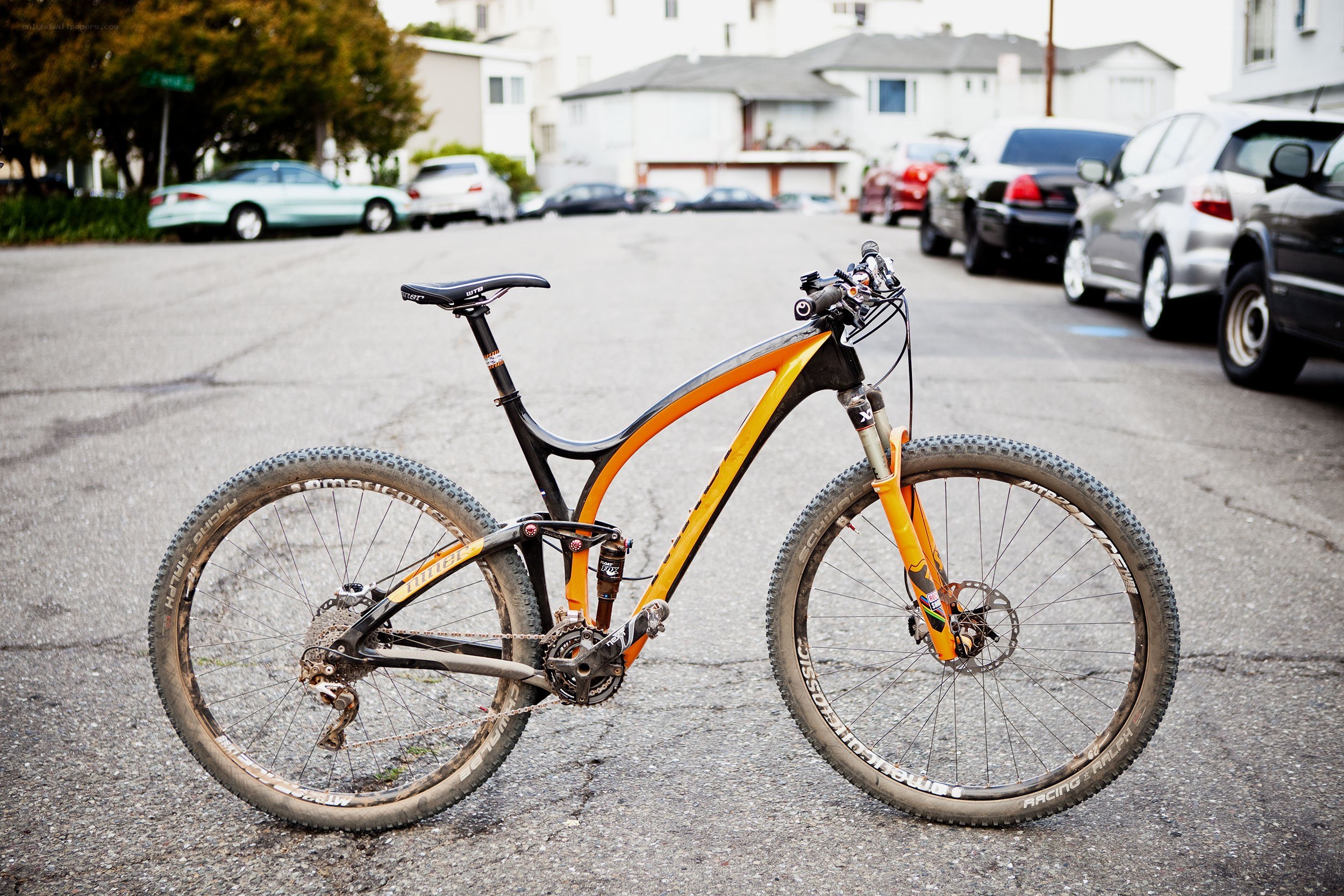 orange mountain bike on street