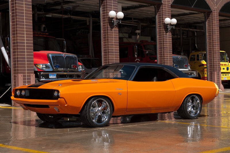 Orange muscle car at fire station