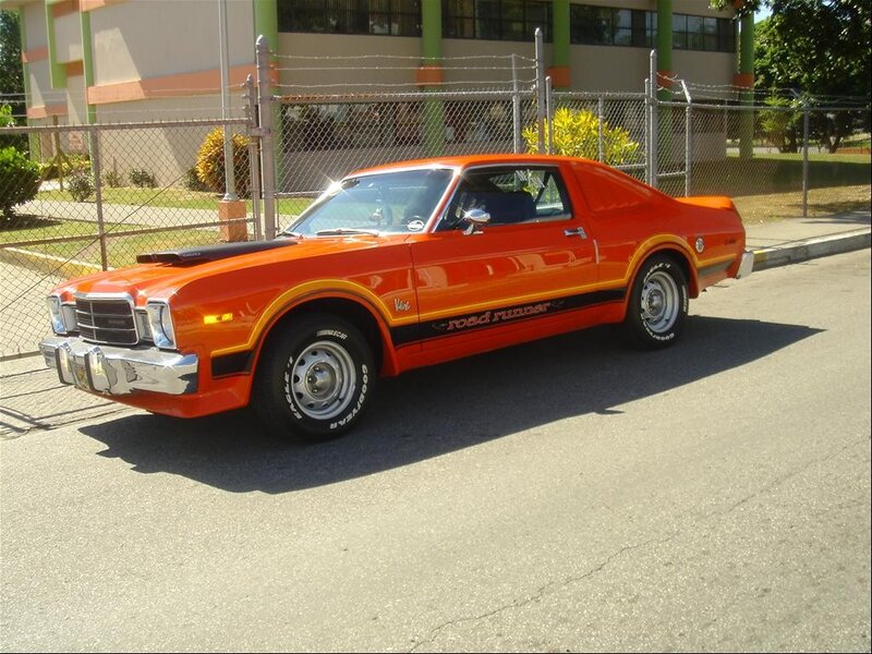 Orange Muscle Car — Calm, Afternoon, Photograph, Fence