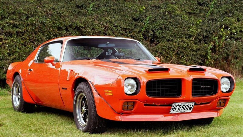 Orange Muscle Car — Calm, Afternoon, Photograph, Grass, Hedge