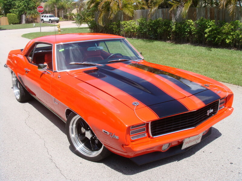 Orange Muscle Car — Calm, Afternoon, Photograph, Stop Sign