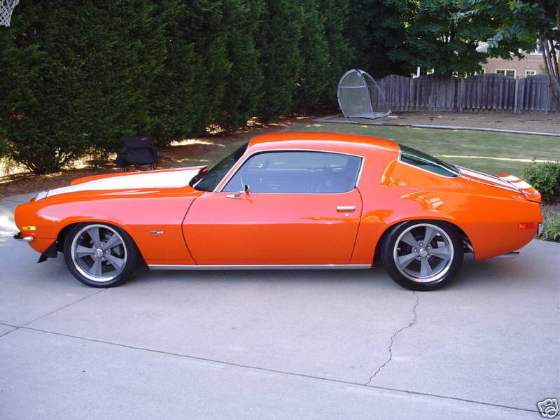 Orange Muscle Car — Calm, Afternoon, Photograph, Tree, Fence