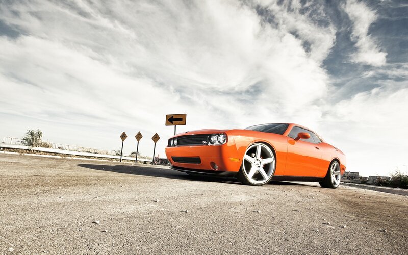Orange Muscle Car — Dramatic, Afternoon, Photograph, Road Signs, Cloudy Sky