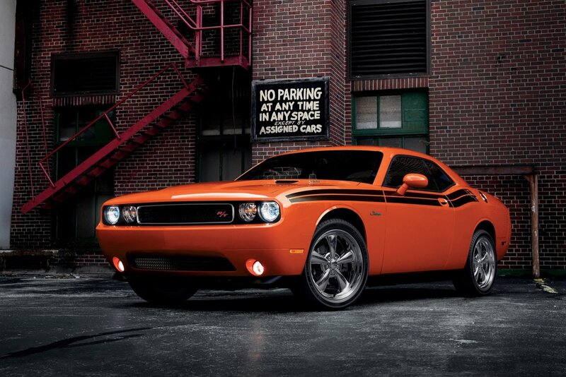 Orange Muscle Car — Dramatic, Photograph, Brick Building