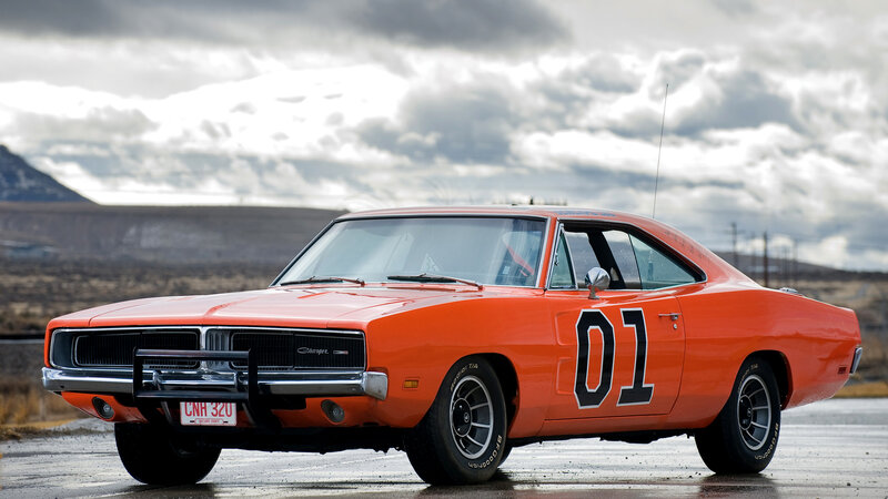 Orange Muscle Car — Dramatic, Photograph, Cloudy Sky