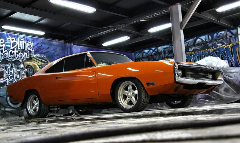 Orange Muscle Car — Dramatic, Photograph, Graffiti Wall