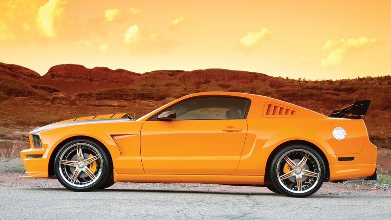 Orange Muscle Car — Dramatic, Sunset, Photograph, Mountains