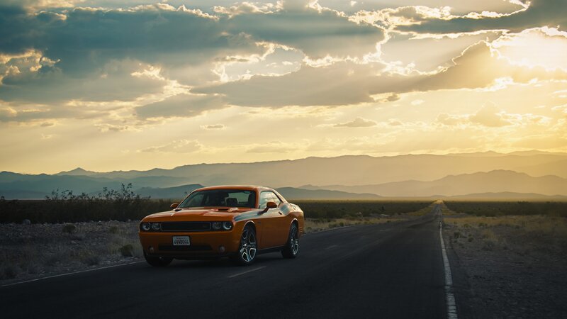 Orange Muscle Car — Dramatic, Sunset, Photograph, Road