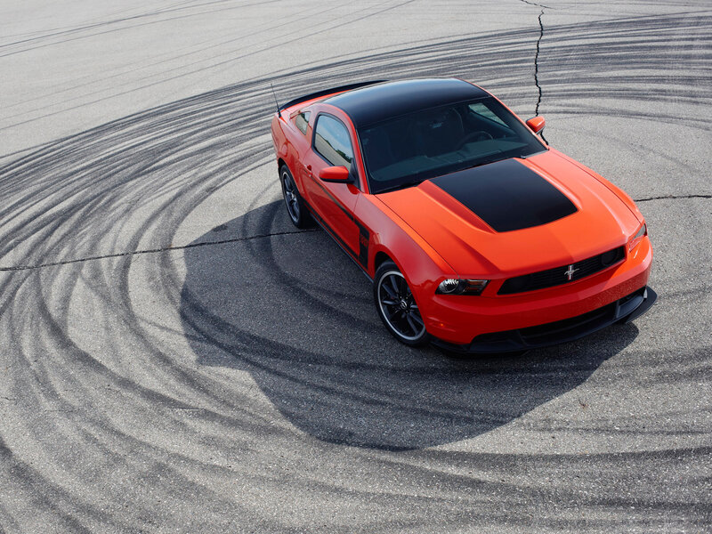 Orange Muscle Car — Dynamic, Afternoon, Photograph, Tire Marks
