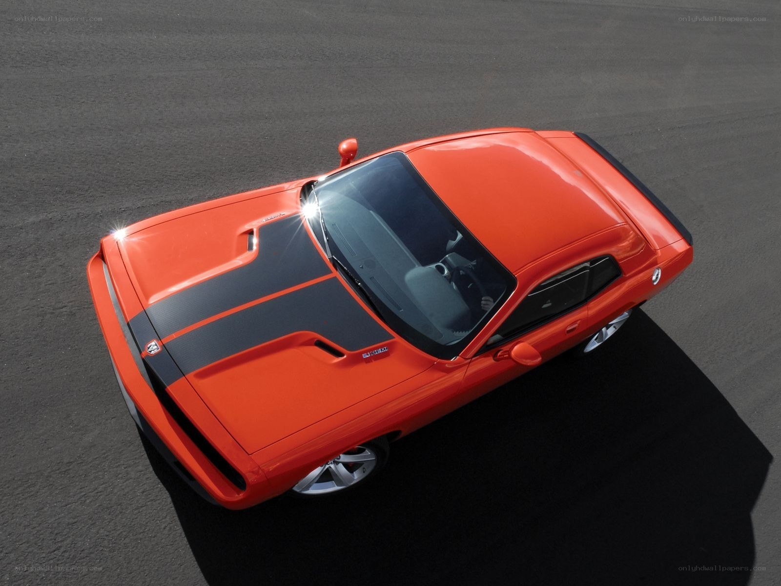 Orange muscle car from above