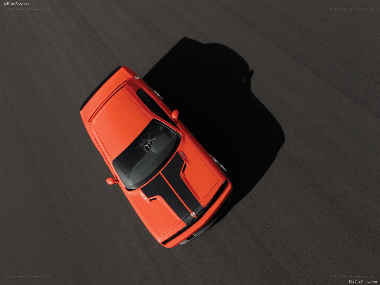 Orange muscle car from above