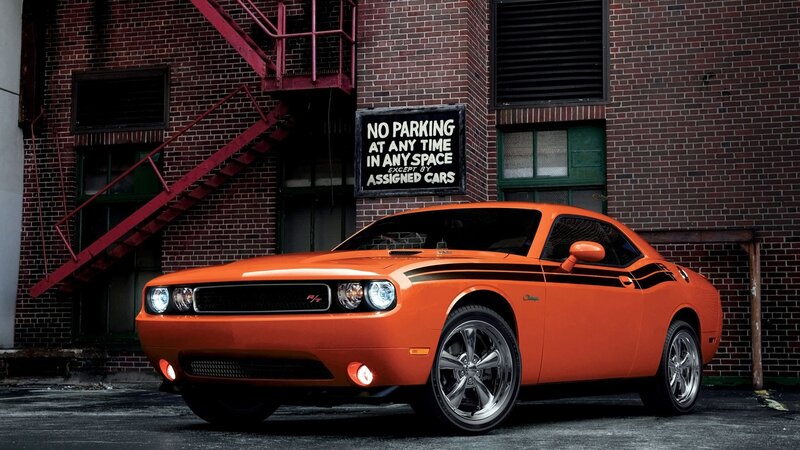 Orange muscle car in alley