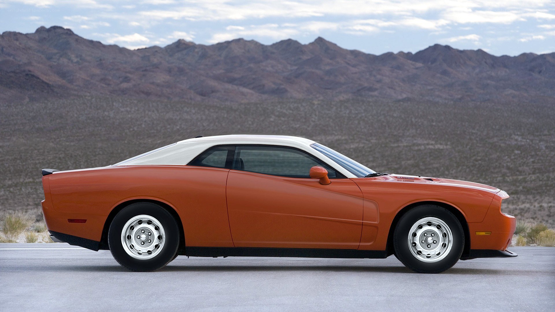 Orange muscle car in desert