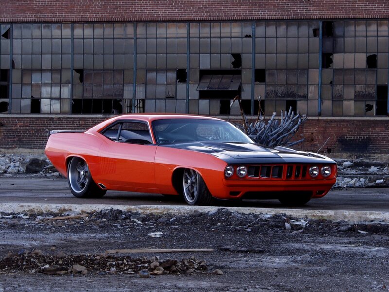 Orange muscle car in urban decay