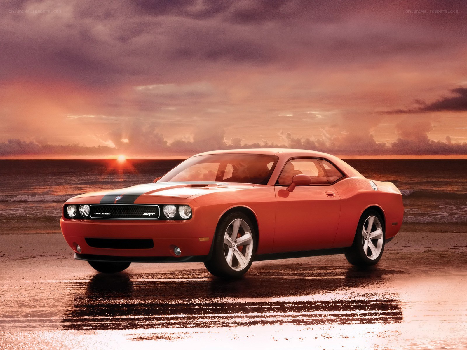 Orange muscle car on beach