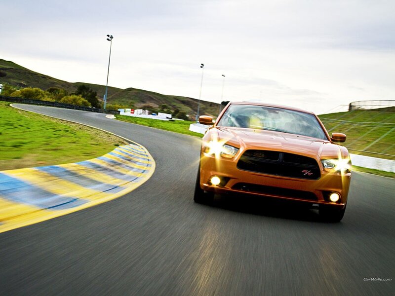 Orange muscle car on racetrack