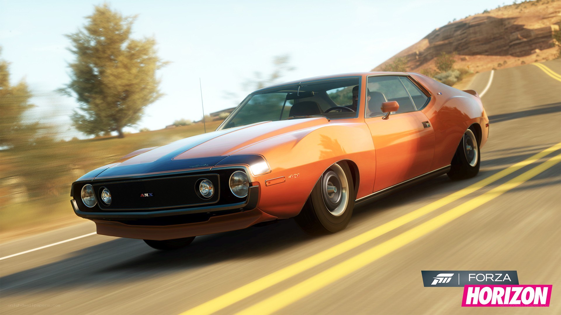 Orange muscle car on road
