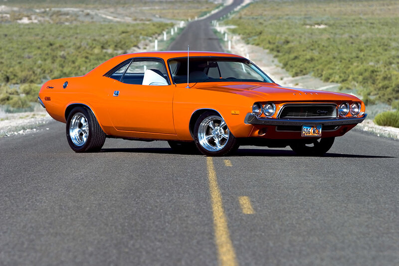 Orange muscle car on road