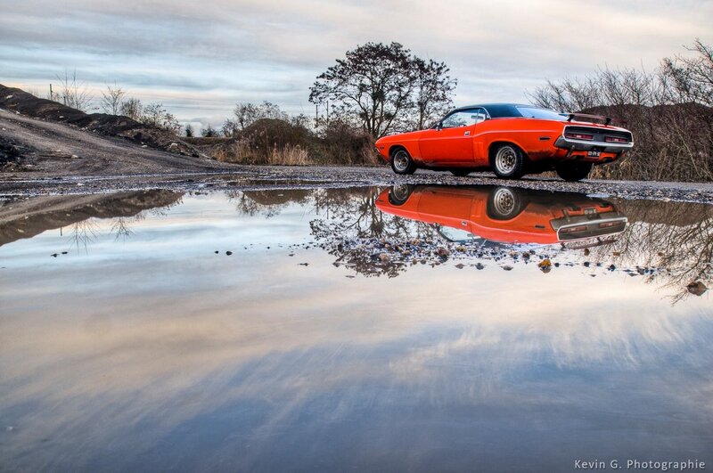 Orange muscle car reflection