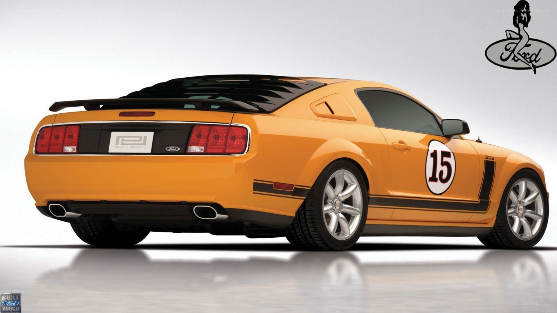 orange mustang with racing decals
