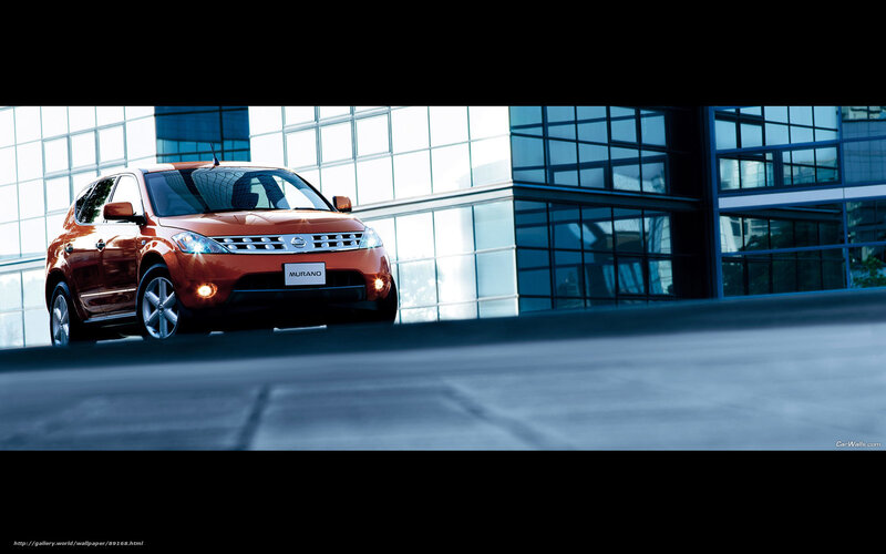 Orange Nissan Murano in city