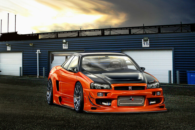 orange nissan skyline at racetrack