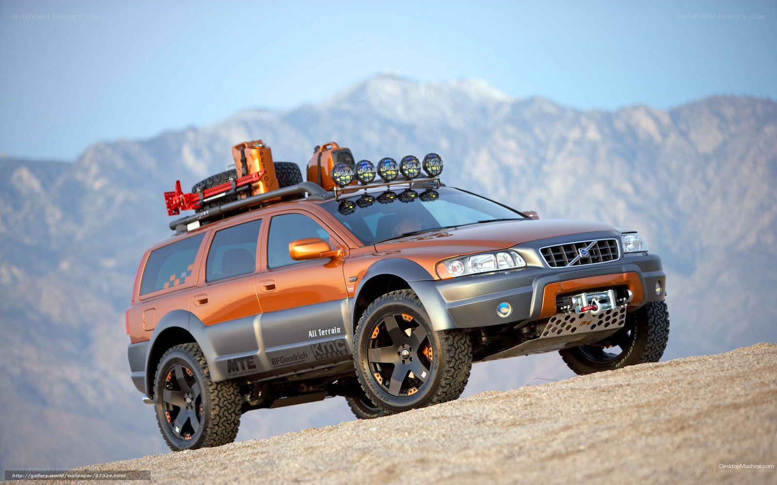 Orange off-road SUV on mountain
